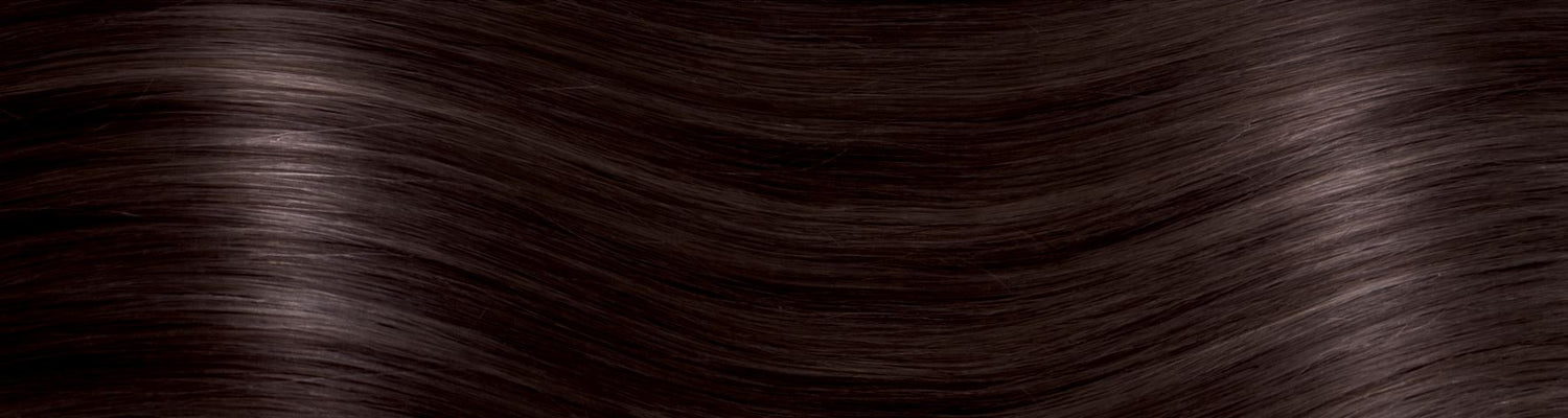 ILENIA Parrucca in fibra sintetica rifinita a mano